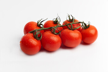 red tomatoes on a white