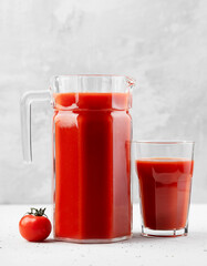 tomato juice in jug and tomato