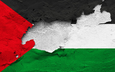 Graphic Concept of a damaged Flag of Palestina painted on a wall.