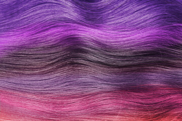 Beautiful multicolored hair as background, closeup view