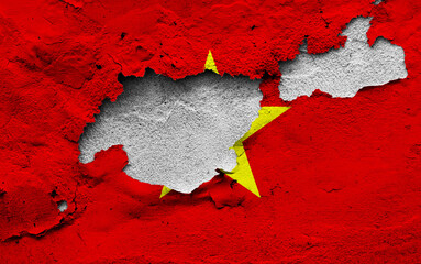Graphic Concept of a damaged Flag of Vietnam painted on a wall.