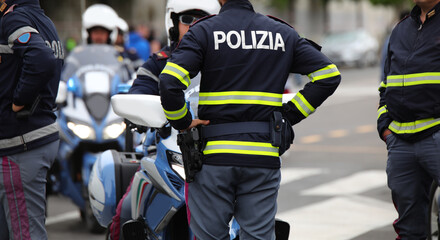 CheckPoint with many policemen and uniform with text POLIZIA that means POLICE in Italian language