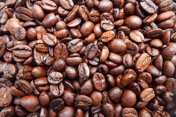 Beautiful grains of coffee, close up. Background, texture