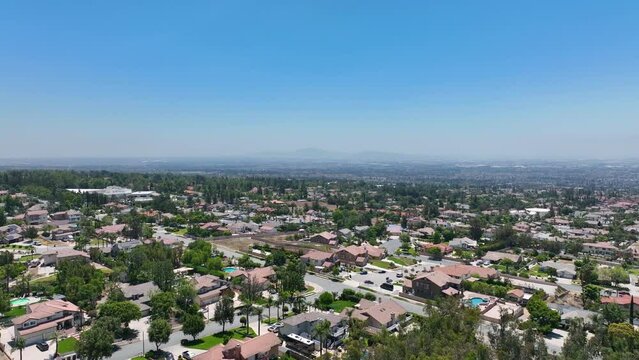 Aerial view of wealthy Alta Loma community and mountain range, Rancho Cucamonga, California, United States