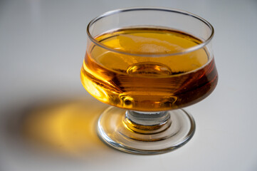 Glass of apple cider drink on white table, Normandy, France