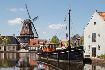 Windmill along the canal in the center of the city of Meppel.