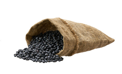 Organic black beans in sack isolated on white background.