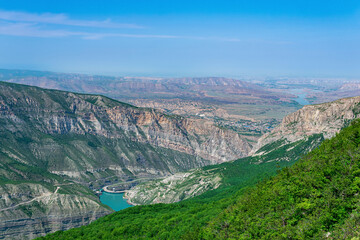 mountain landscape in the Caucasus with a view of the valley of the Sulak River, the Miatli hydroelectric power station and the towns of New Zubutli and Kizilyurt in the distance