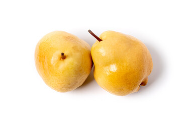 the background is white. the pear is ripe. close-up. studio lighting.