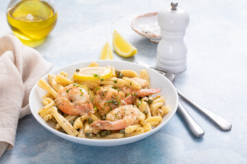 Lemon shrimp piccatta with penne, lemons and capers