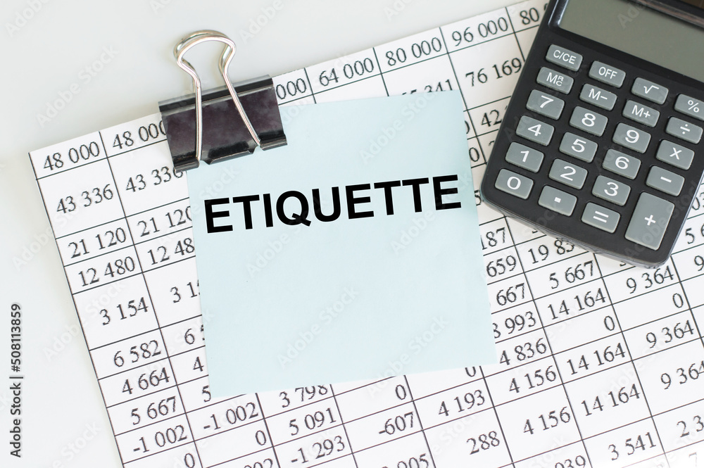 Poster a business card with etiquette text on a clip to a sheet of paper with numbers on a light background
