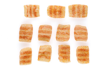Chips salty bacon snack close up, on white background. Top view.