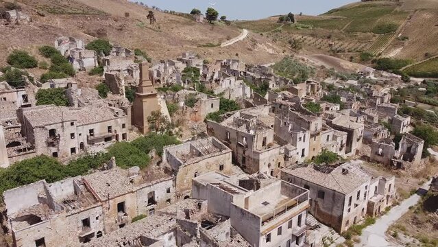 Aerial drone view of the ruins of Poggioreale on the Belice valley, in the province of Trapani. The town was destroyed by and earthquake in 1968. Abandoned empty eerie ghost town in Sicily.