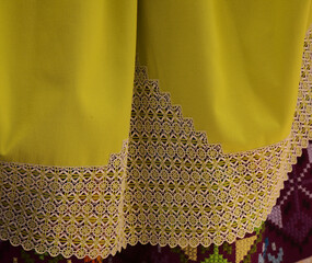 Traditional Canary Islands costume details - skirts with open work embroidery insets