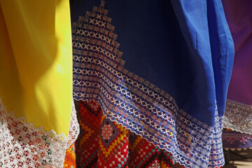 Traditional Canary Islands costume details - skirts with open work embroidery insets