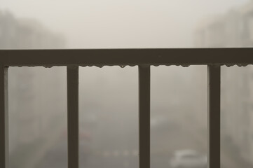 Fototapeta premium water drops on the baconny during winter foggy day