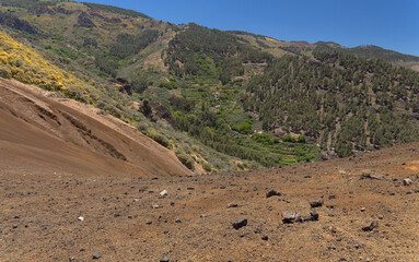 Fototapeta na wymiar Gran Canaria, landscape of the San Mateo municipality, orange volcanic gravel mountain Montana del Cosdeso 