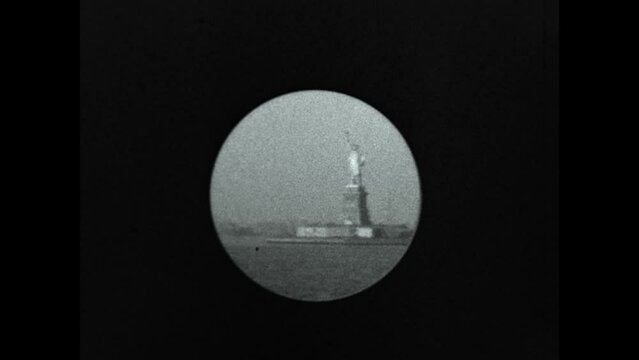 Liberty Through a Porthole 1934 - The Statue of Liberty is viewed through the porthole of a steamship in 1934.