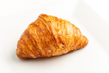 fresh croissant on the white
