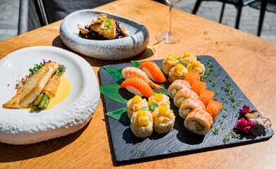 sushi and white wine outdoor