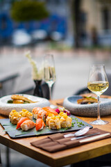 sushi and white wine outdoor