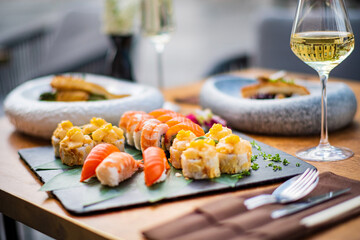 sushi and white wine outdoor