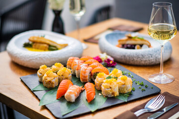 sushi and white wine outdoor