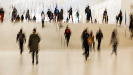 Blur of focus, people in the lobby of a public building