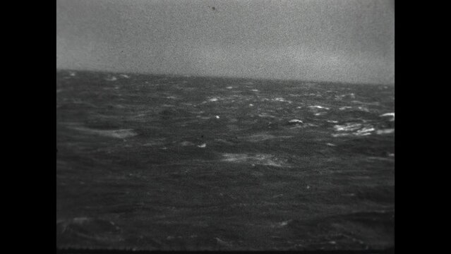 Stormy Seas 1934 - First person views, first through a porthole, of stormy seas from a ship at sea in 1934.
