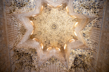 Ornamental ceiling and walls in Nasrid Palaces in the Alhambra palace Granada, Andalusia, Spain - obrazy, fototapety, plakaty