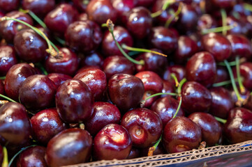 Fresh ripe sweet cherry berries on market