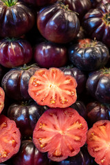 Ripe tasty organic tomatoes for sale on farmers market in Malaga, Andalusia, Spain