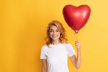 happy redhead woman with red heart balloon. happy valentines day