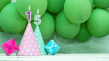 Birthday number 15, a beautiful card with balloons and numbers from candles, a happy birthday...