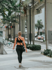 person walking on the street Downtown woman miami 