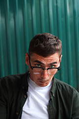 Funny young man. Man wearing eyeglasses. Happy smiling smart man. Portrait of handsome smiling stylish hipster lambersexual model. Stylish people. Success. Career. Cool men. Teacher