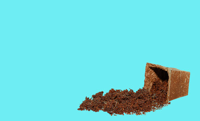 A simple brown seeding fibre pots and coconut coir isolated on blue  background. Environmental Friendly concept.