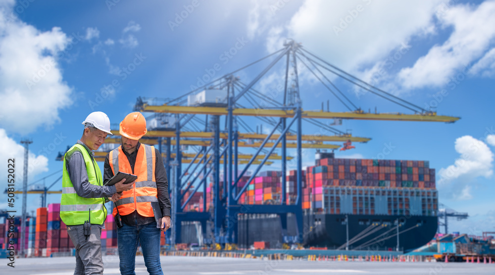 Aufkleber engineer wearing uniform inspection and detail on tablet with logistics container dock cargo yard wo