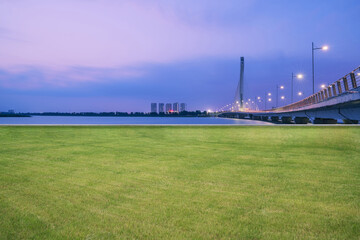 Fototapeta na wymiar Modern urban buildings, bridges and park lawns in Changzhou, Jiangsu Province, China