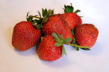 STRAWBERRIES ON A WHITE BACKGROUND