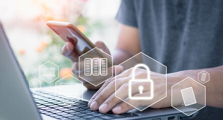 cyber security online technology and multi-factor authentication concept. man using smartphone and laptop with icon graphic Cyber security network of connected devices and personal data security.