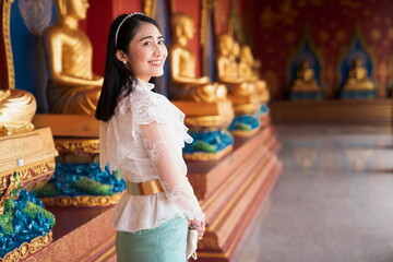 woman in a dress Thai style in the temple