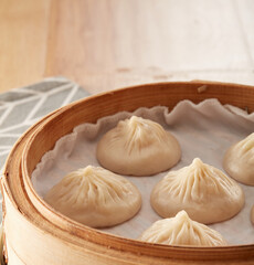 Xiaolong soup dumplings in a steamer