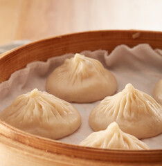 Xiaolong soup dumplings in a steamer