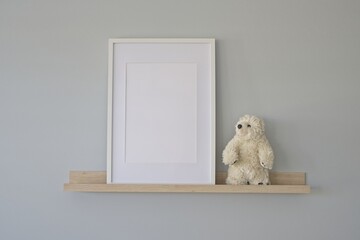 White frame mockup with toy