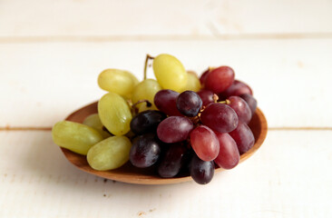 Grape that is the raw material of wine on the table