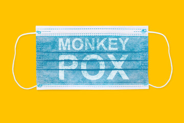Face masks with inscriptions MONKEY POX. Monkey pox outbreak around the world.