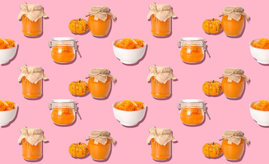 Many jars and bowls of sweet pumpkin jam on pink background. Pattern for design