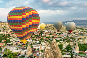 Hot air balloons flying over Goreme Historical National Park