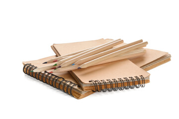 Notebooks with pencils on white background